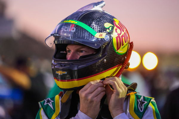 NORTH WILKESBORO, NC &#8211; AUGUST 31: Dale Earnhardt Jr. (3) straps on his helmet before the Cars Tour LMSC 125 on Aug 31, 2